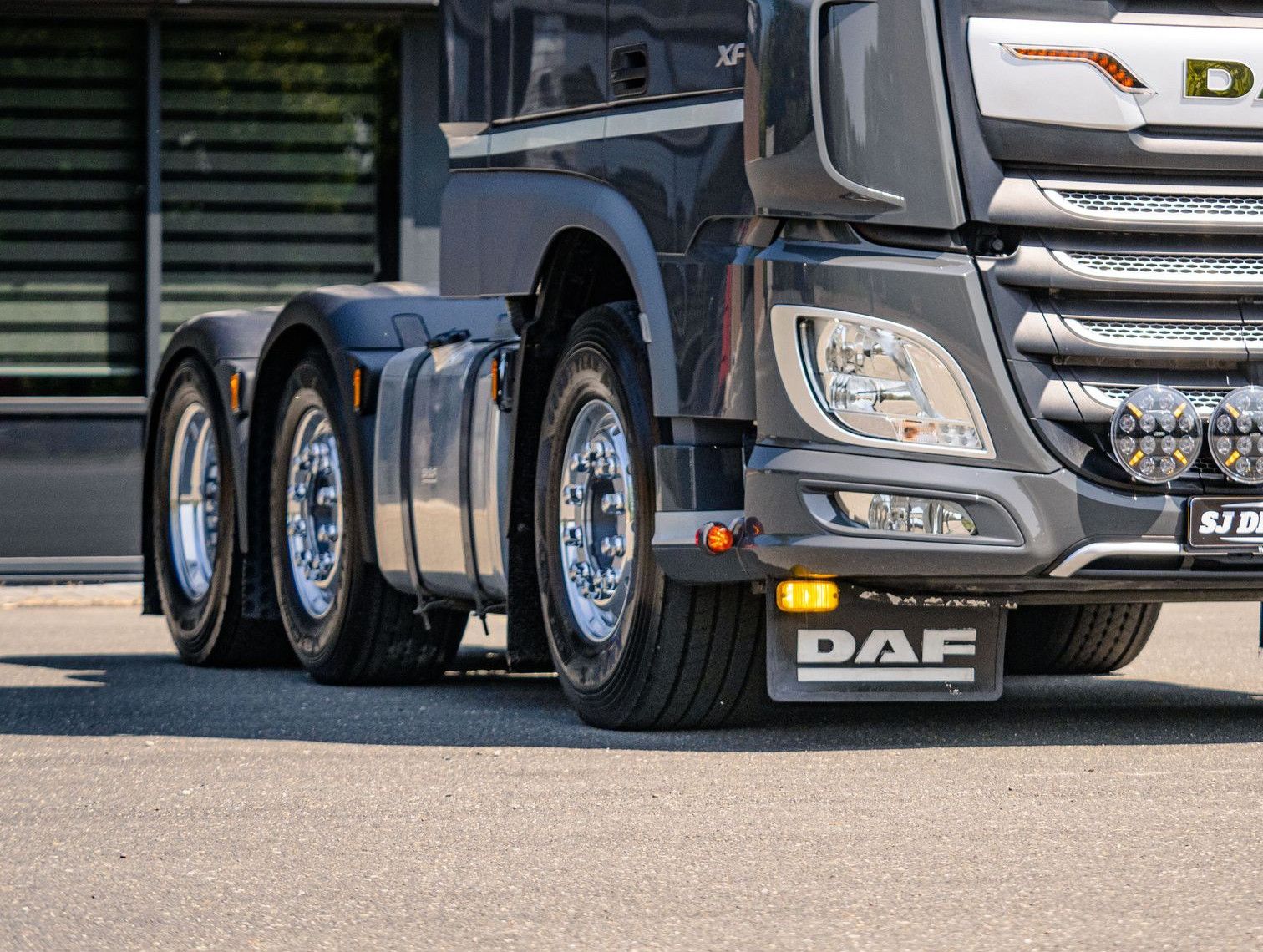 A highly detailed DAF truck parked outdoors in Andijk, Noord-Holland. Captures modern automotive design.